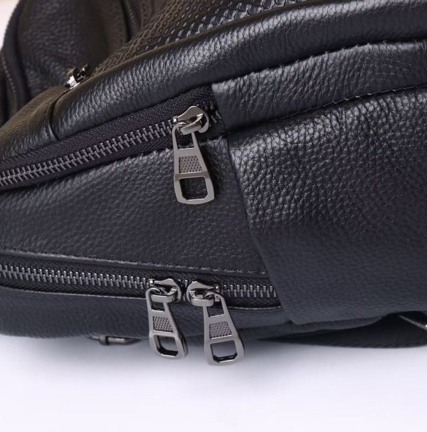 Рюкзак жіночий шкіряний з тичненням під рептилію чорний 34926 Tiding Bag