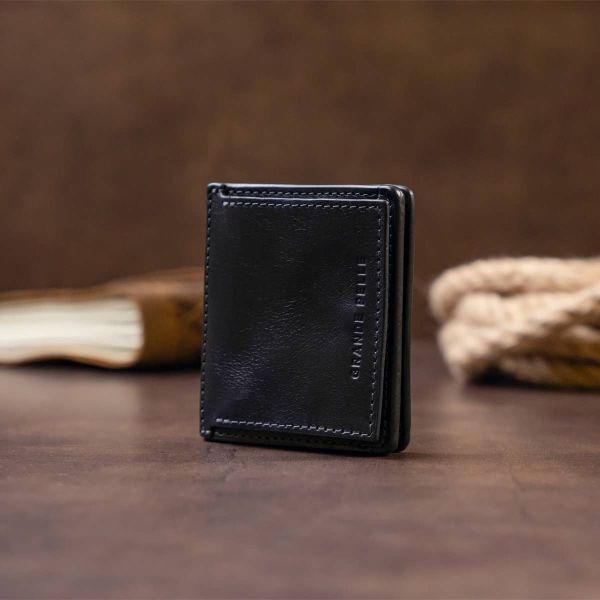 Вертикальное глянцевое портмоне с накладной монетницей Grande Pelle 11332 синее