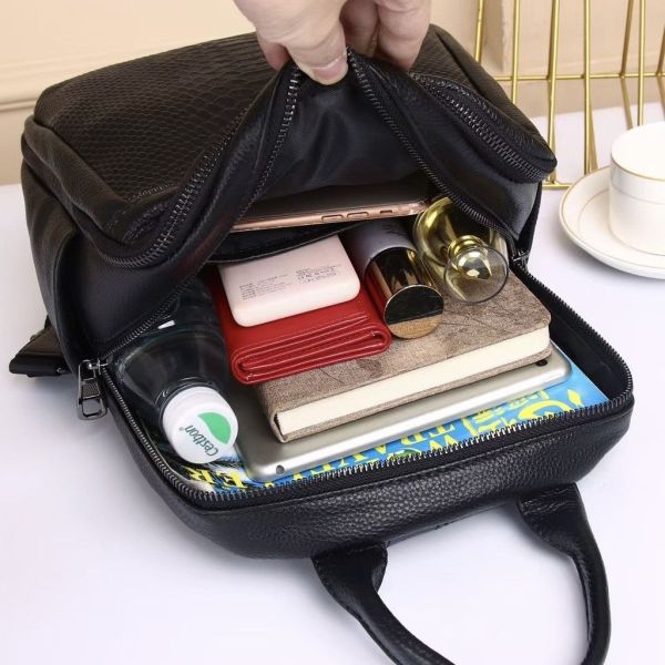 Рюкзак жіночий шкіряний з тичненням під рептилію чорний 34926 Tiding Bag