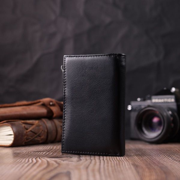 Шкіряний жіночий гаманець у три складання ST Leather 22488 чорний