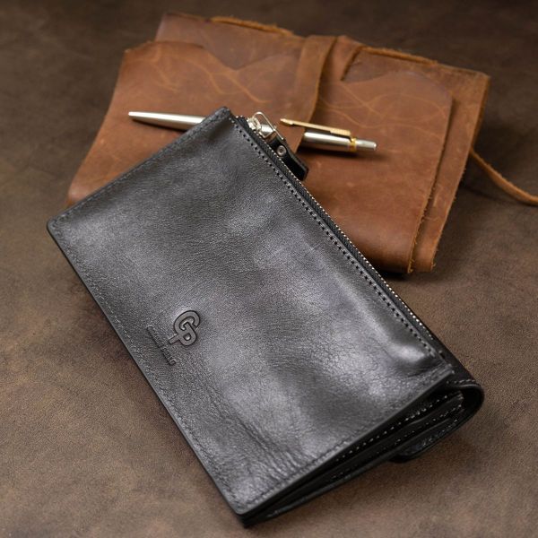 Практичный стильный портмоне унисекс Grande Pelle 11558 черный